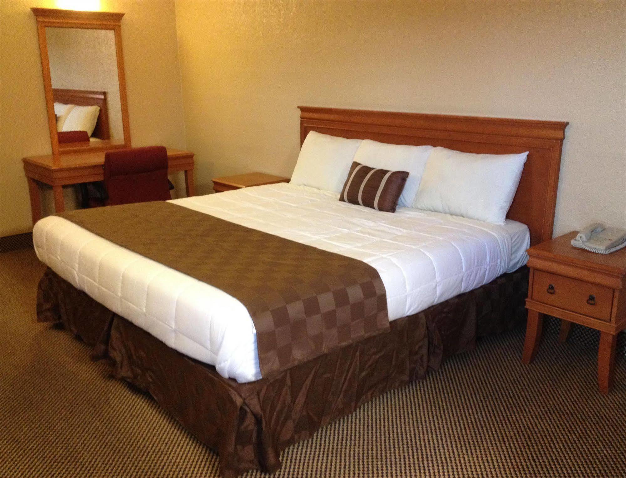 Economy Express Inn Henryetta Exterior foto